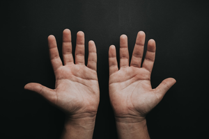Two hands, palms facing up